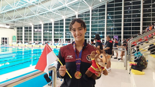 Emas Pertama Renang Dari Masniari Wolf