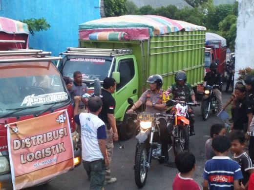 Pakai Motor Trail, Kapolres Bitung Terjun Langsung Kawal Distribusi Logistik Pemilu 2019