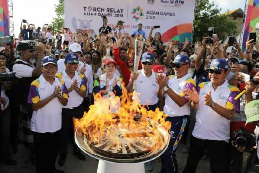 Kirab Obor Api Asian Games 2018 Jejaki Pulau Dewata dan Berselancar di Pantai Kuta